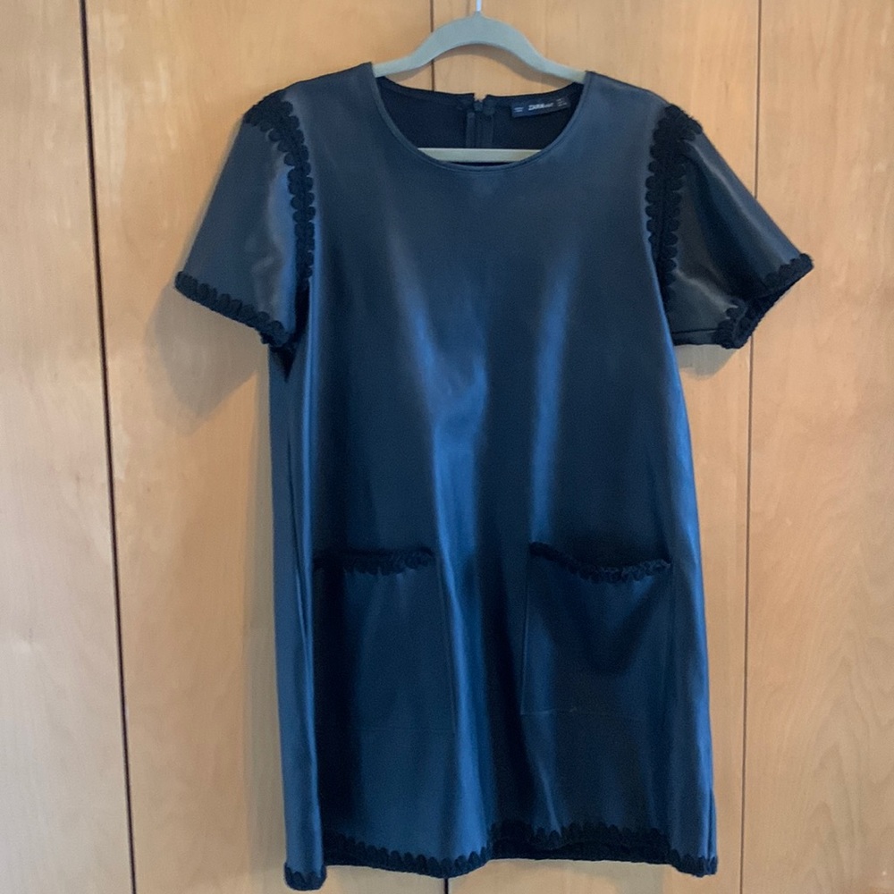 Zara Faux leather dress in black. With crochet detail.